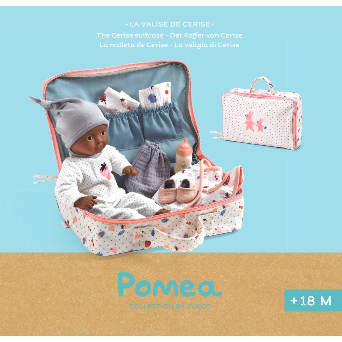 Babypuppe im Koffer mit Kleidung und Zubehör