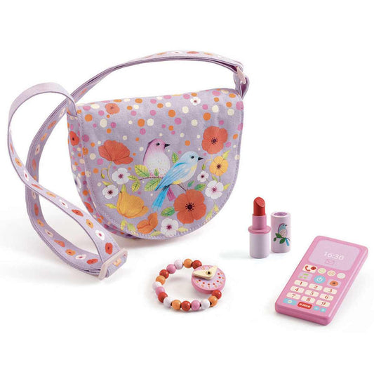 Handtasche mit Telefon Armbanduhr und Lippenstift